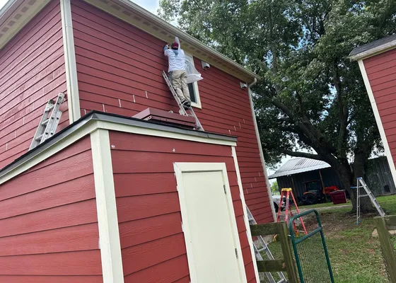 Exterior repaint of a Houston home in progress