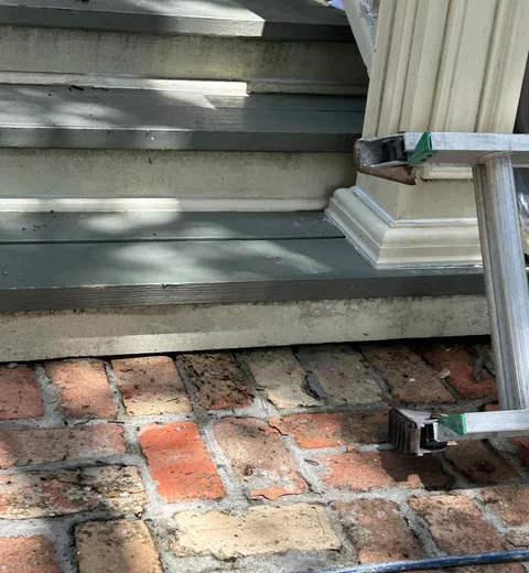 AA Home Remodeling crew working on a Houston home exterior